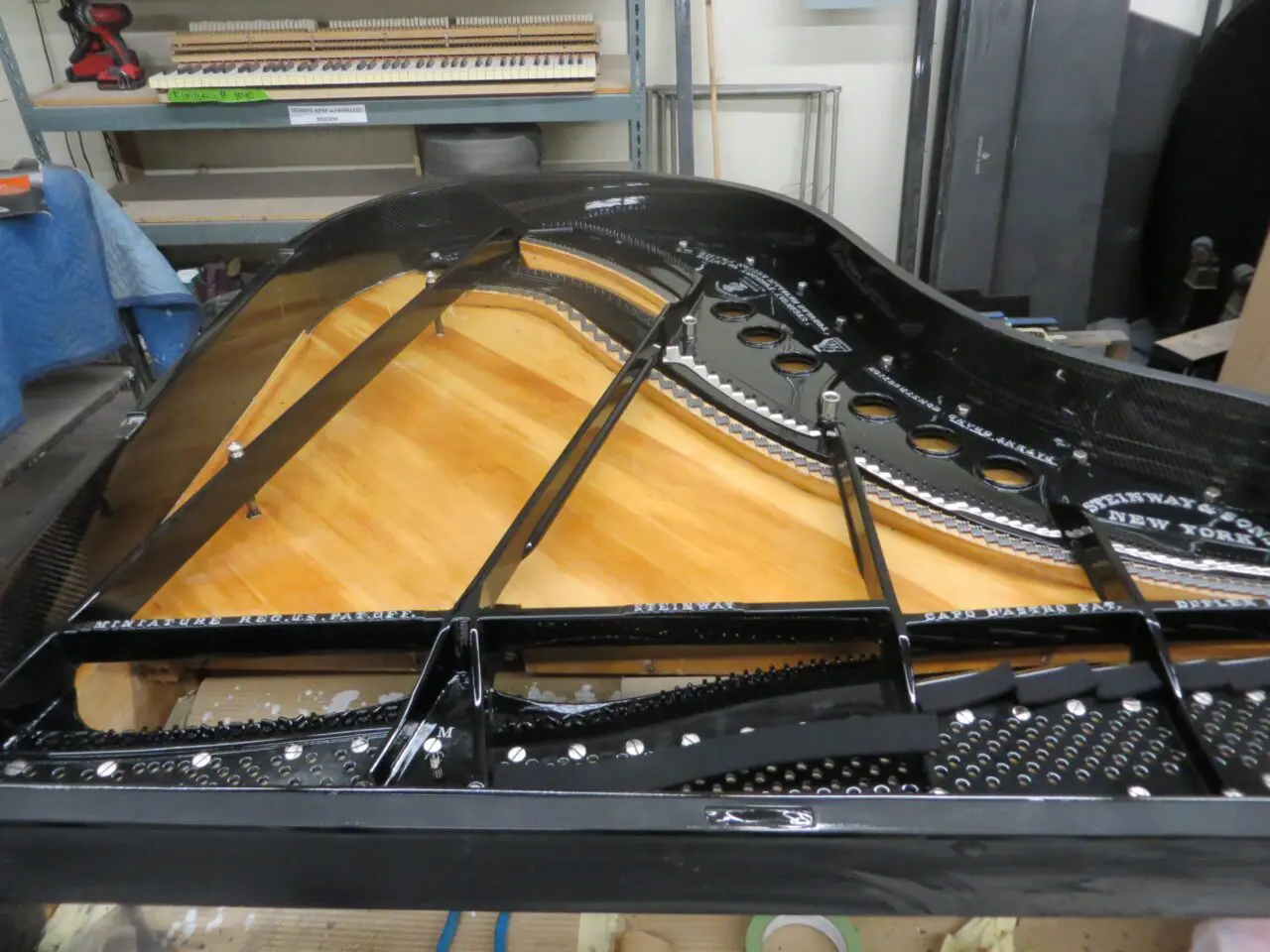 A piano that is being worked on.