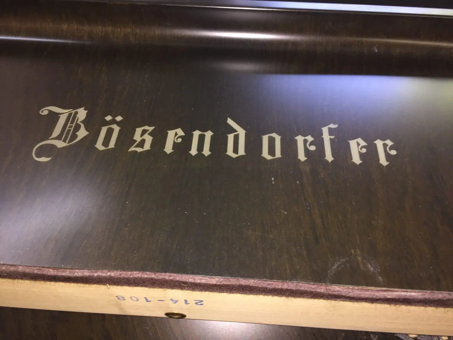 A wooden tray with the words 