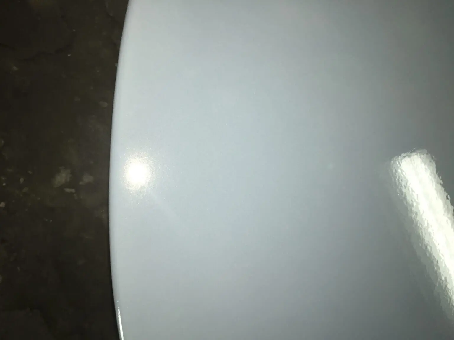 A white plate sitting on top of a table.