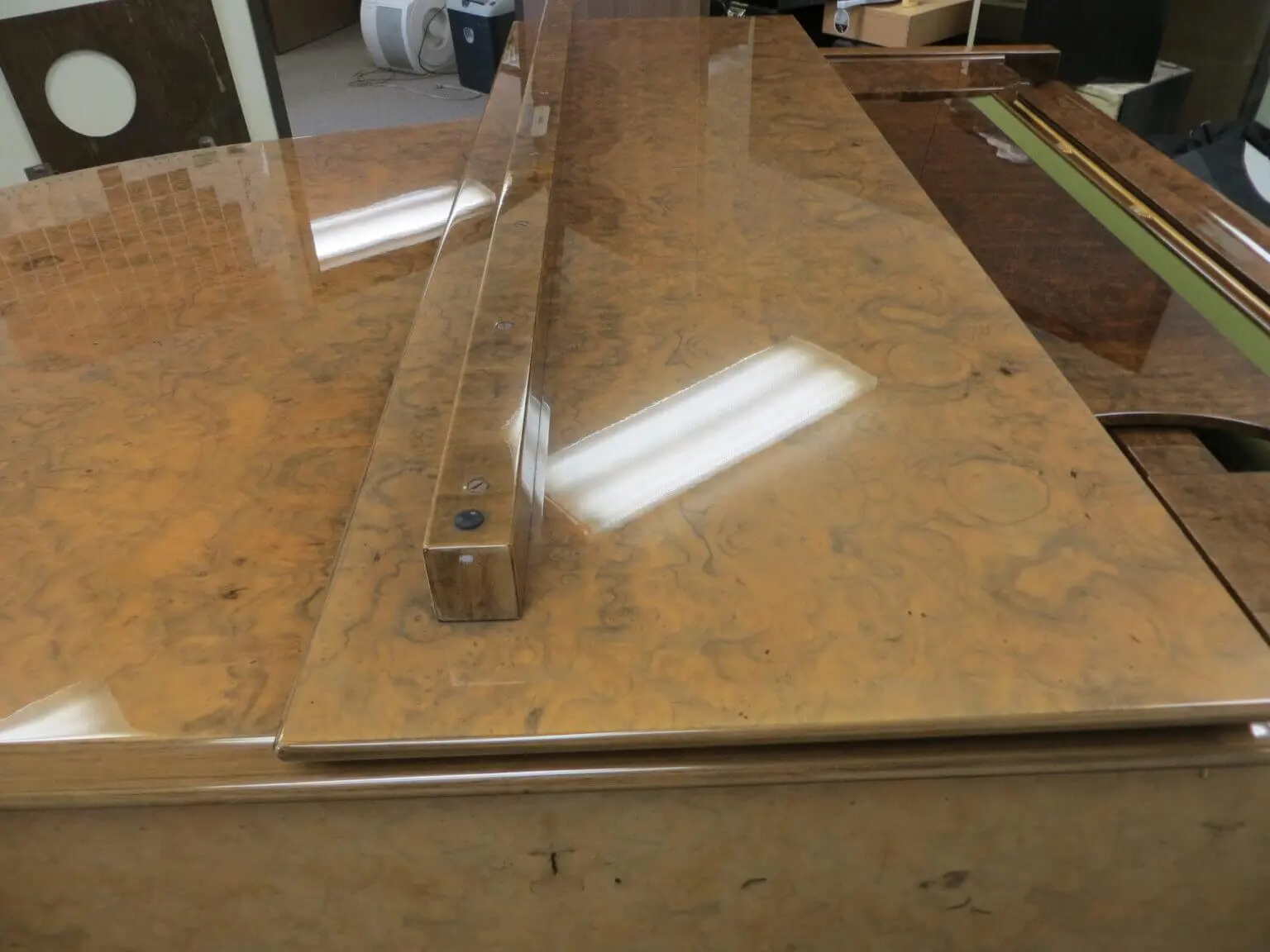 A marble table with a ruler on top of it.